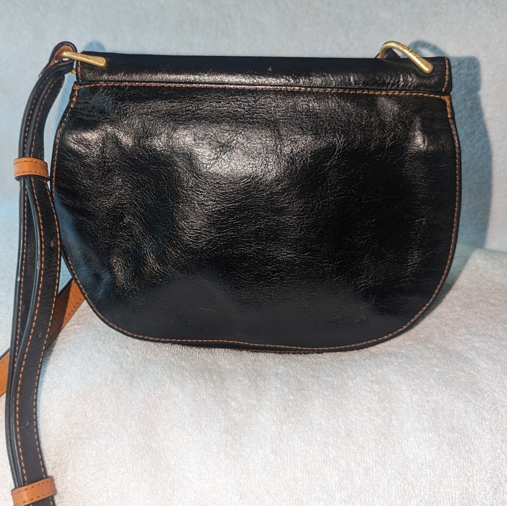 Vera Bradley Sidesaddle leather crossbody bag.